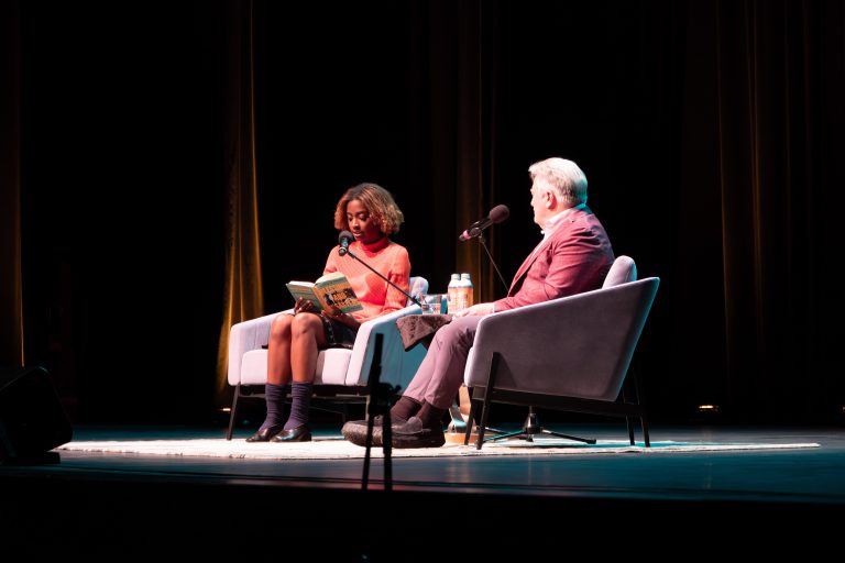 Alexis Okeowo and Charles Doneland on stage at Campbell Hall.